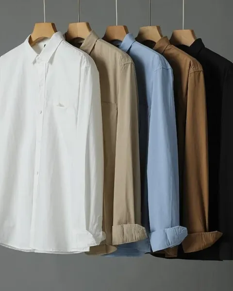 Silk blouses hanging in premium UAE dry cleaners