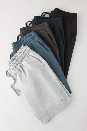 Neatly folded linen shirts, shorts, and summer dresses delivery in Dubai
